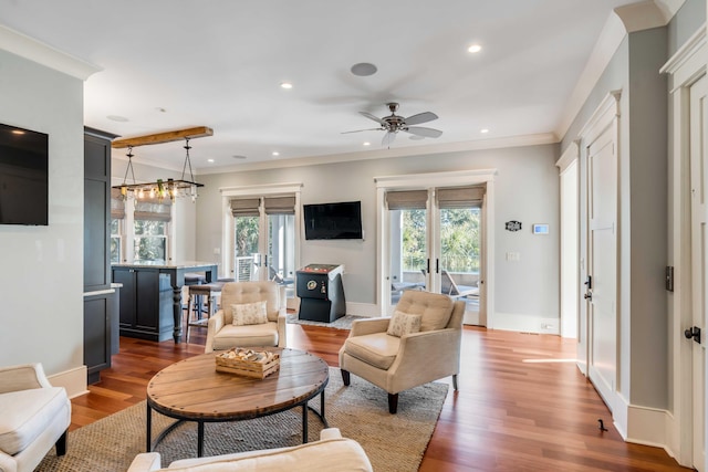 4001 Palm Blvd, Isle Of Palms, SC 29451 - living area featuring dark wood-style flooring, ornamental molding, recessed lighting, a ceiling fan, and baseboards