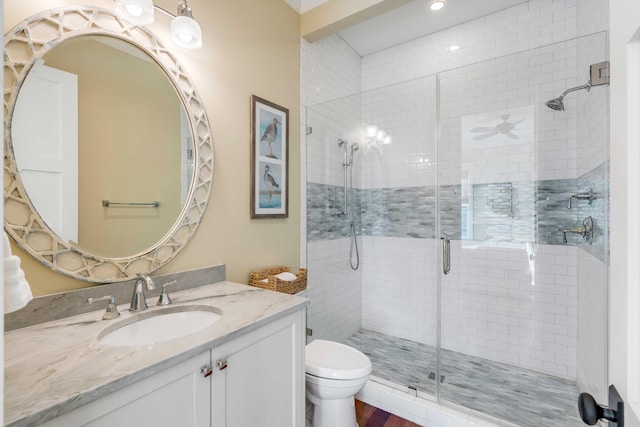 4001 Palm Blvd, Isle Of Palms, SC 29451 - full bathroom with vanity, a stall shower, toilet, ceiling fan, and recessed lighting