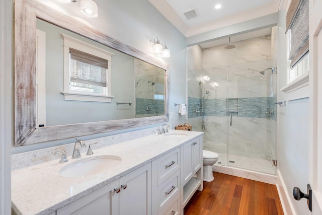 4001 Palm Blvd, Isle Of Palms, SC 29451 - full bath featuring a marble finish shower, toilet, double vanity, and wood finished floors