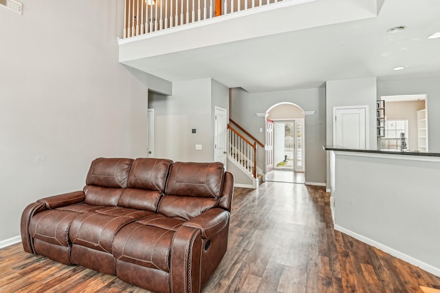 living room featuring dark hardwood / wood-style floors