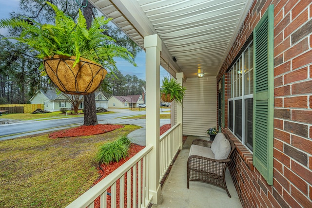 balcony featuring a porch