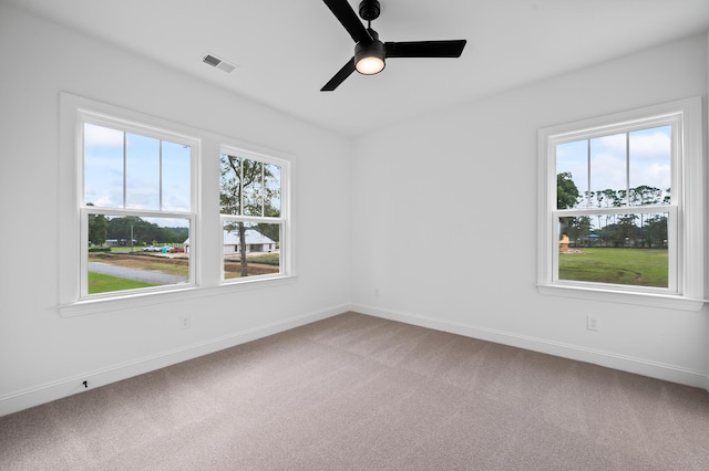 5655 Captain Kidd Rd, Hollywood, SC 29449 - spare room featuring visible vents, a ceiling fan, baseboards, and light colored carpet