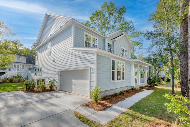 5655 Captain Kidd Rd, Hollywood, SC 29449 - view of property exterior with a lawn, fence, an attached garage, and driveway