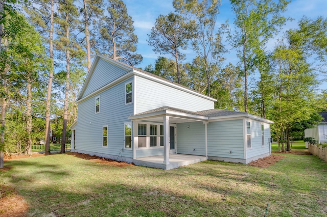5655 Captain Kidd Rd, Hollywood, SC 29449 - back of property with a lawn, fence, and a patio