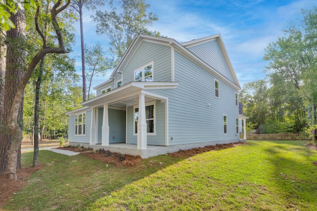 5655 Captain Kidd Rd, Hollywood, SC 29449 - view of property exterior with fence, covered porch, and a yard