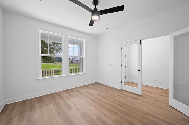 5655 Captain Kidd Rd, Hollywood, SC 29449 - unfurnished bedroom with baseboards, ceiling fan, light wood-style flooring, and visible vents