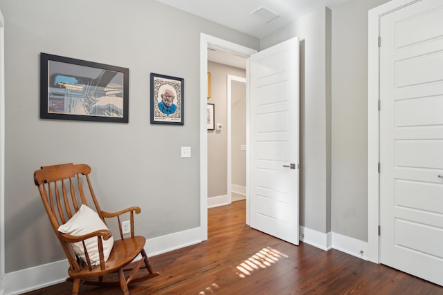 living area featuring dark hardwood / wood-style flooring