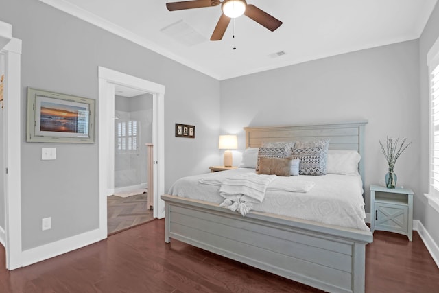 bedroom with ceiling fan, dark hardwood / wood-style flooring, ensuite bath, and crown molding