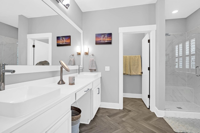 bathroom with walk in shower, parquet flooring, and vanity