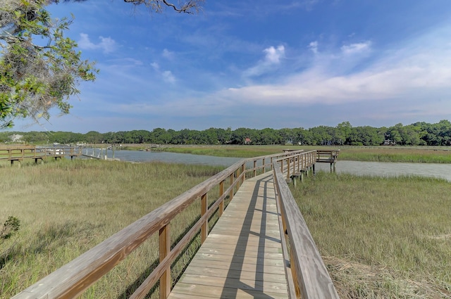 dock area featuring a rural view and a water view