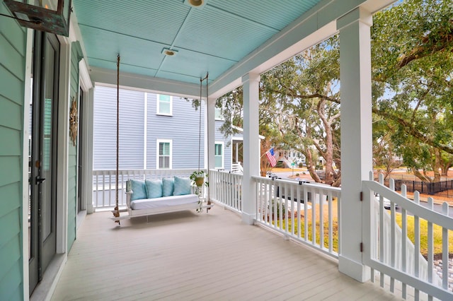 wooden terrace with covered porch