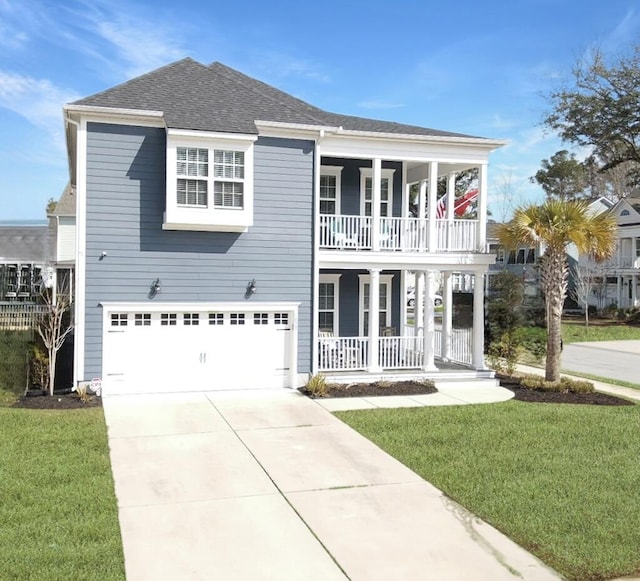 view of front of property featuring a porch, a shingled roof, a balcony, driveway, and a front lawn