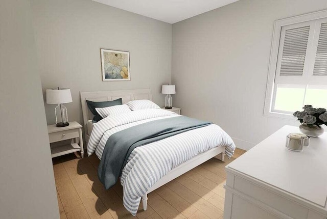 bedroom with light hardwood / wood-style floors