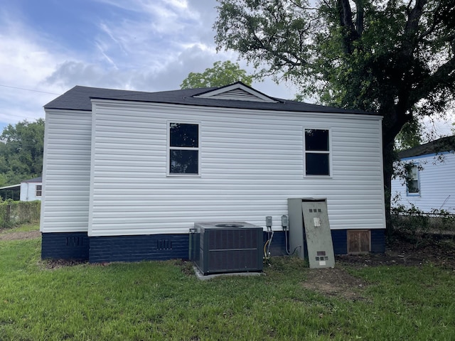 2327 Bailey Dr, North Charleston, SC 29405 - rear view of property featuring central air condition unit, a yard, and crawl space