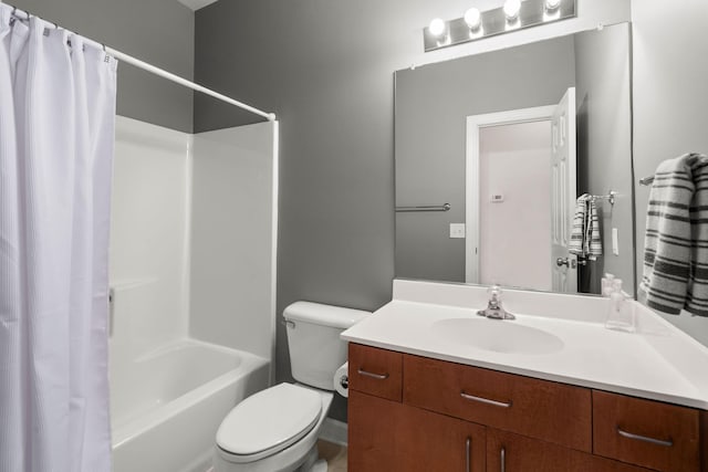 full bathroom featuring shower / bath combination with curtain, toilet, and vanity