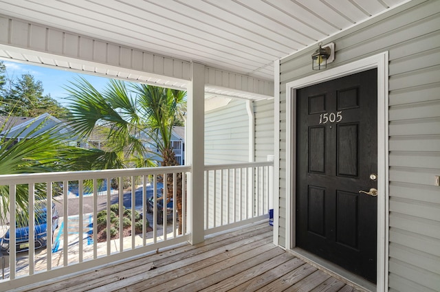 entrance to property with a balcony