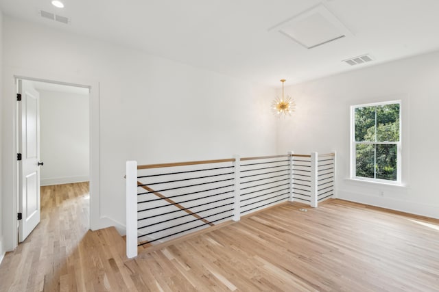 unfurnished room featuring light wood-type flooring