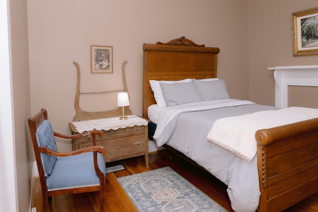 bedroom featuring wood finished floors