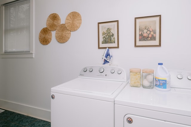 laundry room featuring washer and dryer and laundry area