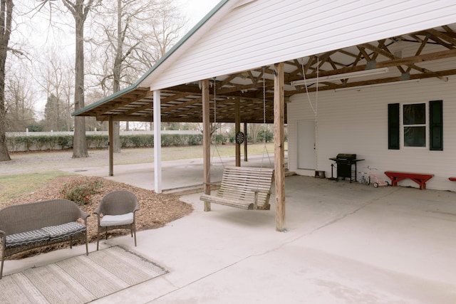 view of patio featuring a carport and grilling area