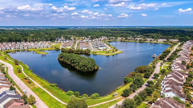 aerial perspective of suburban area featuring a large body of water