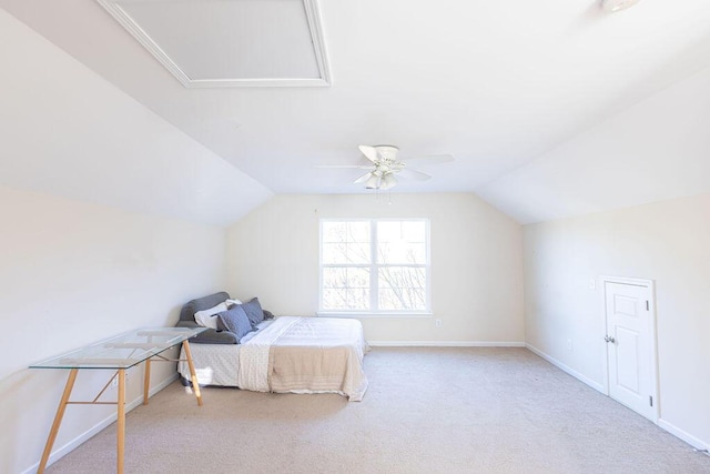 unfurnished bedroom featuring vaulted ceiling, ceiling fan, carpet, and baseboards