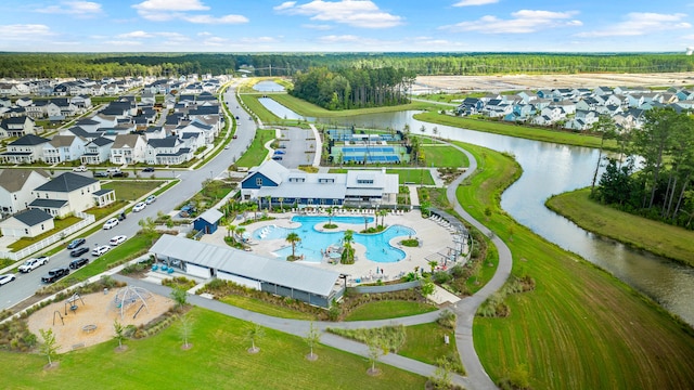 bird's eye view with a water view