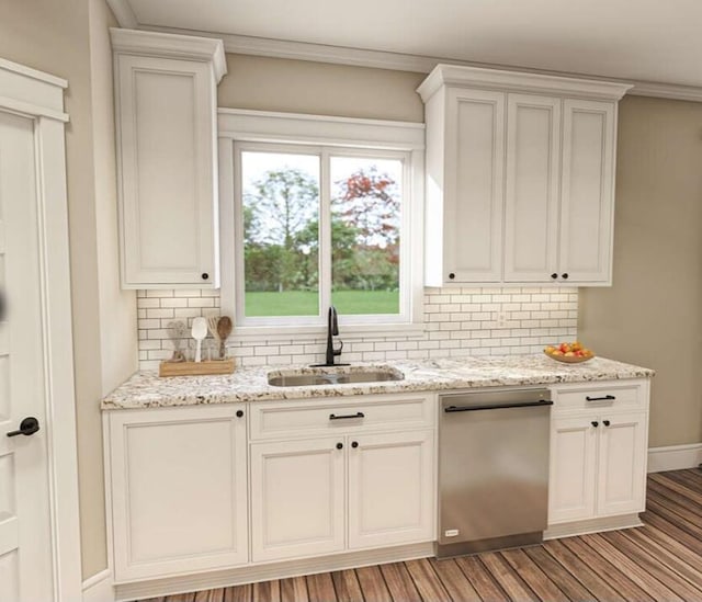 kitchen featuring sink, white cabinets, light wood-type flooring, stainless steel dishwasher, and backsplash