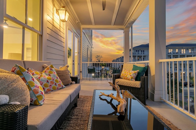 view of balcony at dusk