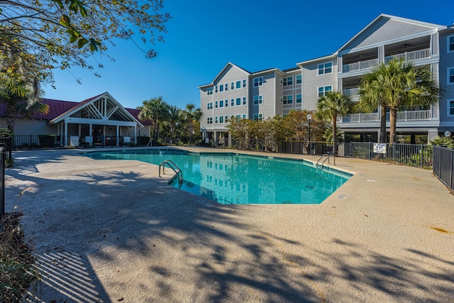 view of swimming pool featuring a patio