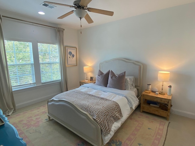 bedroom with light carpet, baseboards, visible vents, a ceiling fan, and recessed lighting