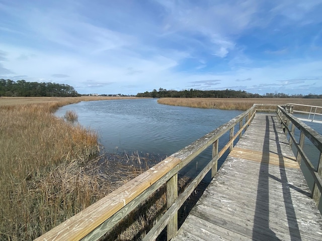 dock area featuring a water view