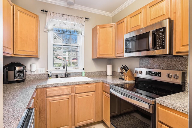 kitchen with a sink, crown molding, light brown cabinets, and stainless steel appliances