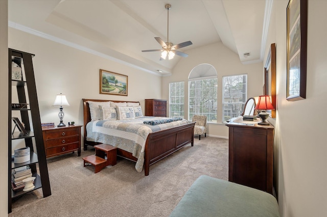 bedroom with light carpet, vaulted ceiling, ornamental molding, a ceiling fan, and baseboards
