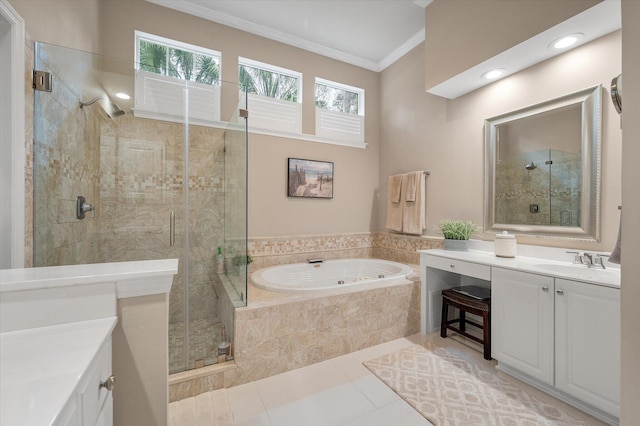 full bathroom featuring a shower stall, crown molding, vanity, a whirlpool tub, and tile patterned floors