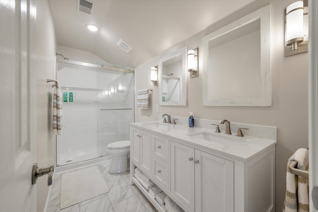 bathroom with toilet, marble finish floors, a shower stall, lofted ceiling, and double vanity