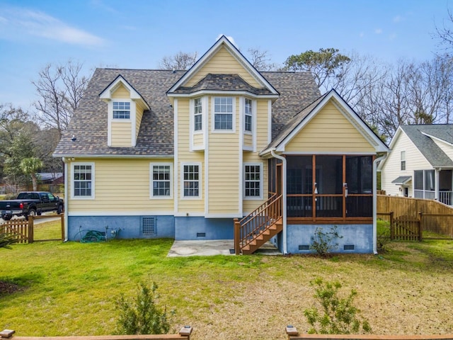 back of house with a lawn, fence, roof with shingles, a sunroom, and crawl space