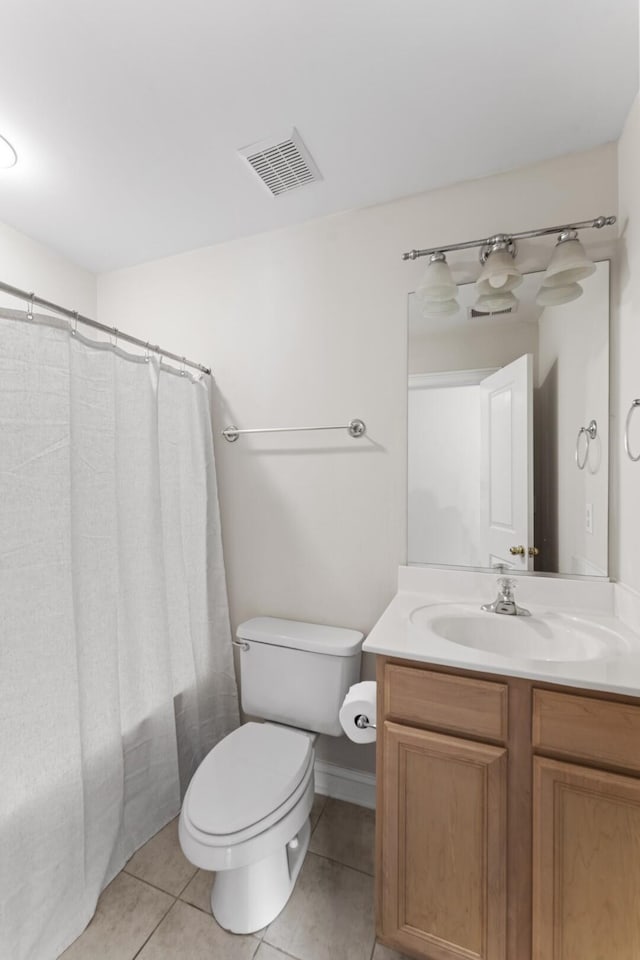 bathroom with vanity, visible vents, curtained shower, tile patterned floors, and toilet