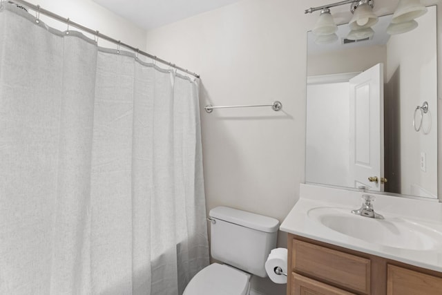 full bathroom featuring vanity, shower / bath combination with curtain, toilet, and visible vents