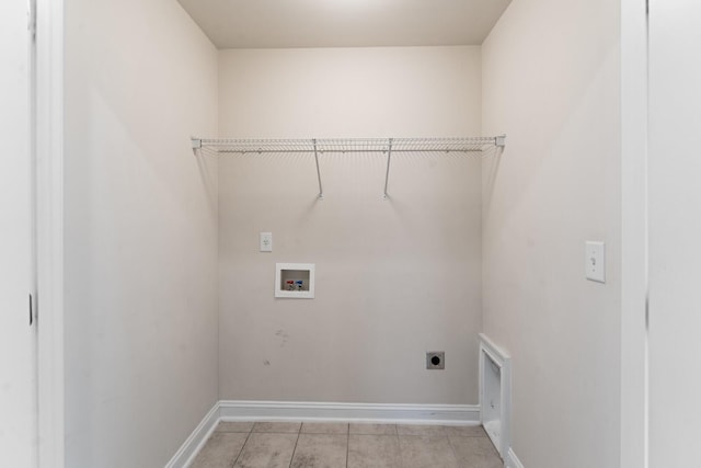 washroom with laundry area, hookup for a washing machine, hookup for an electric dryer, and baseboards