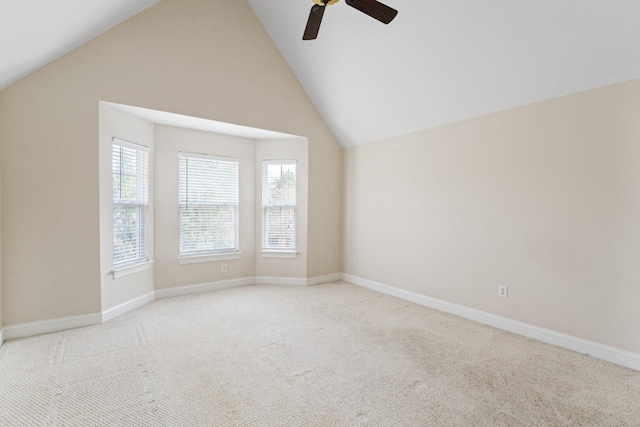 bonus room featuring high vaulted ceiling, a ceiling fan, baseboards, and carpet floors