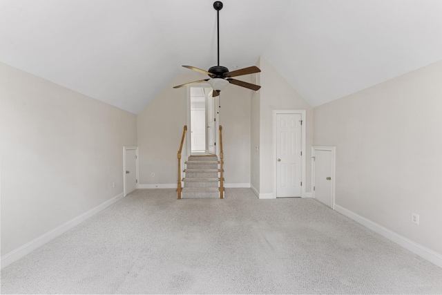 bonus room with stairway, a ceiling fan, carpet, baseboards, and vaulted ceiling