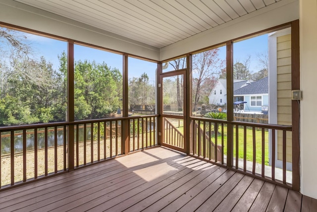 unfurnished sunroom featuring plenty of natural light