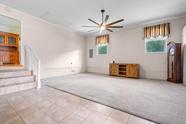 101 Parkside Dr, Goose Creek, SC 29445 - unfurnished living room with attic access, carpet flooring, plenty of natural light, a ceiling fan, and crown molding