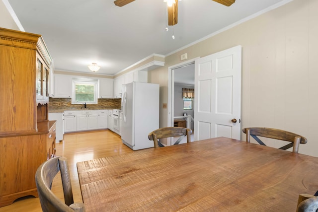 101 Parkside Dr, Goose Creek, SC 29445 - dining room featuring a ceiling fan, light wood-style floors, and ornamental molding