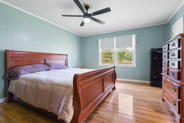 101 Parkside Dr, Goose Creek, SC 29445 - bedroom featuring crown molding, baseboards, light wood-type flooring, and a ceiling fan