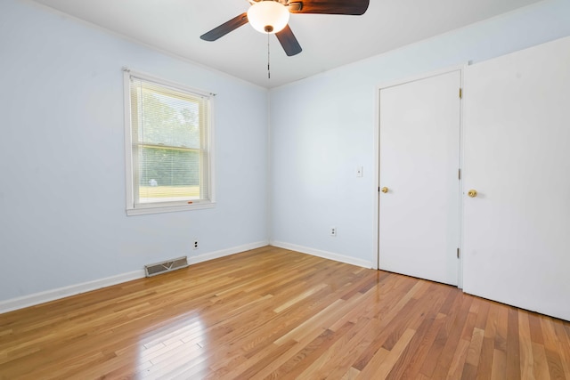 101 Parkside Dr, Goose Creek, SC 29445 - unfurnished bedroom with light wood-type flooring, a ceiling fan, and baseboards