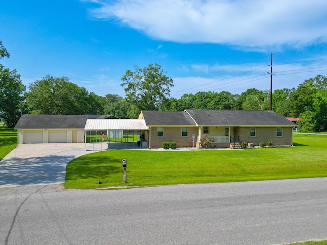 101 Parkside Dr, Goose Creek, SC 29445 - single story home featuring covered porch, a front yard, a carport, concrete driveway, and a garage