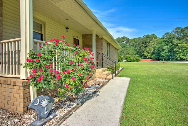 101 Parkside Dr, Goose Creek, SC 29445 - view of green lawn featuring covered porch