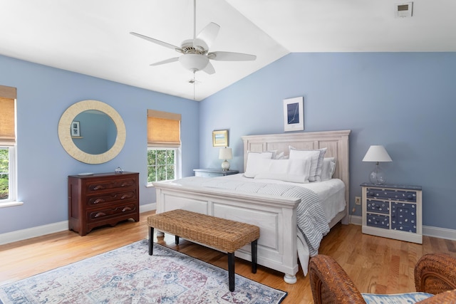 1604 Macoma Dr, Mount Pleasant, SC 29466 - bedroom featuring multiple windows, lofted ceiling, wood finished floors, ceiling fan, and baseboards